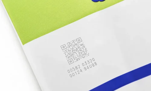 Laser_coding_marks_QR code_batch_info_on_notebook